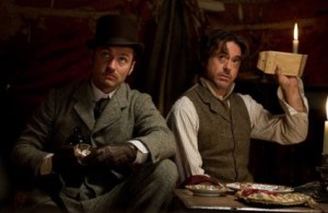 Jude Law and Robert Downey Jr. in Sherlock Holmes: A Game of Shadows. Photo by Daniel Smith – © 2011 Warner Bros. Entertainment Inc. - U.S., Canada, Bahamas & Bermuda,.2011 Village Roadshow Films (BVI) Limited - All Rights Reserved.