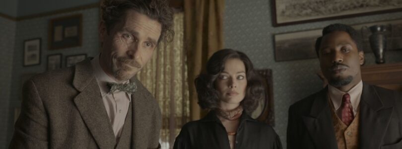 Christian Bale, John David Washington, and Margot Robbie in "Amsterdam"