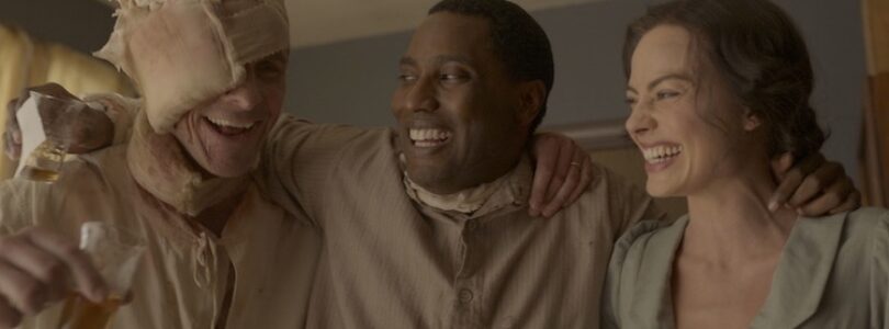 Christian Bale, John David Washington, and Margot Robbie in "Amsterdam"