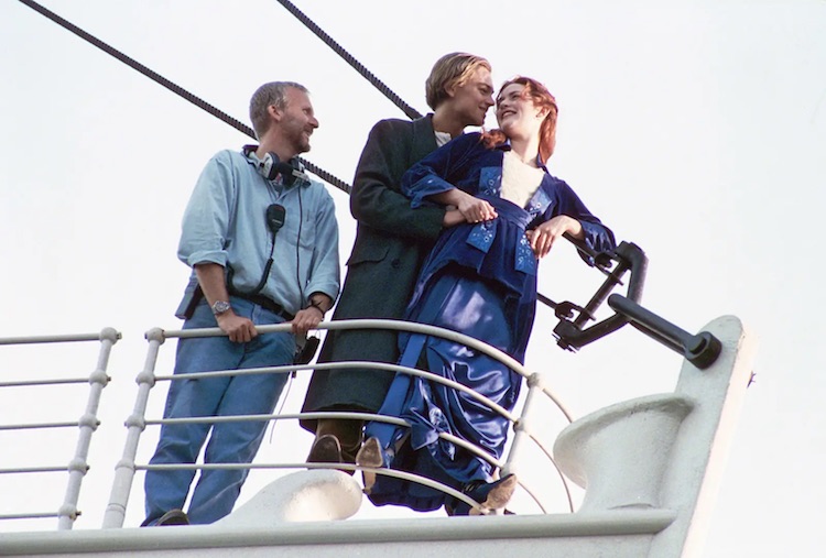 James Cameron (from left), Leonardo DiCaprio, and Kate Winslet on the set of "Titanic."