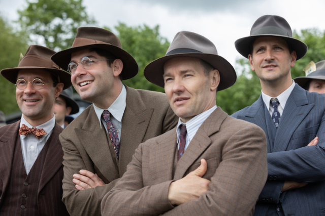Chris Diamantopoulos (l-r) stars as Royal Brougham, James Wolk as Coach Bolles, and Joel Edgerton as Al Ulbrickson in director George Clooney’s THE BOYS IN THE BOAT.