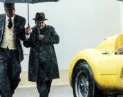 Adam Driver (left) plays Enzo Ferrari preparing for the 1957 Mille Miglia race in "Ferrari."