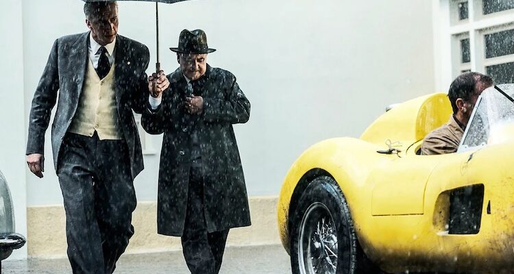 Adam Driver (left) plays Enzo Ferrari preparing for the 1957 Mille Miglia race in "Ferrari."