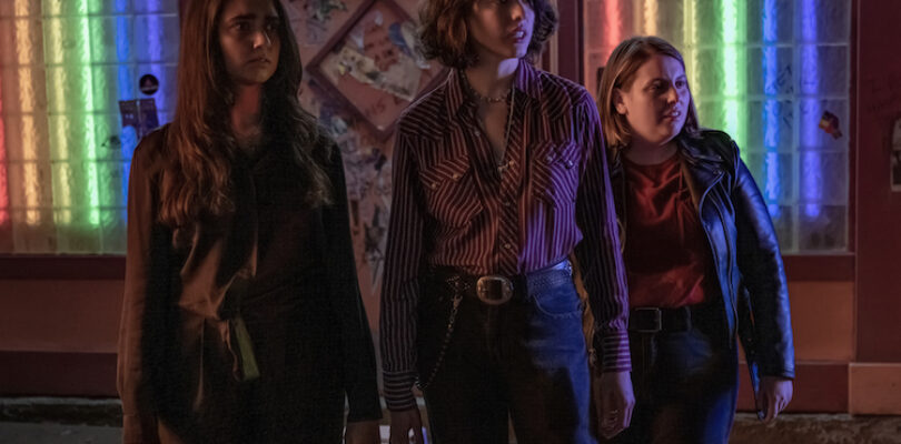 Geraldine Viswanathan (l-r), Margaret Qualley, and Beanie Feldstein in director Ethan Coen's "Drive-Away Dolls."