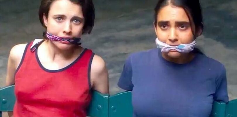 Margaret Qualley and Geraldine Viswanathan in "Drive-Away Dolls."