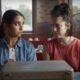 Geraldine Viswanathan and Margaret Qualley in "Drive-Away Dolls."