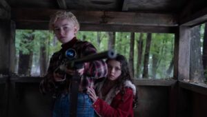 Matilda Firth and Julia Garner in “Wolf Man.”