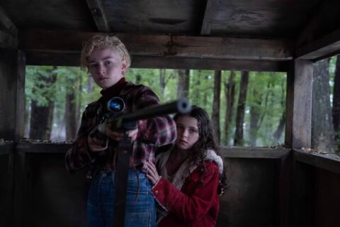 Matilda Firth and Julia Garner in “Wolf Man.”