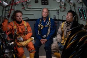 Woody Harrelson, Simu Liu, and Finn Cole in "Last Breath."