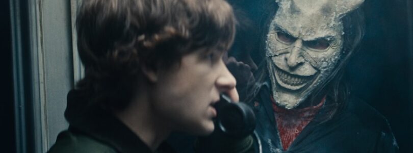 Finn (Mason Thames) and The Grabber (Ethan Hawke) in “Black Phone 2,” written and directed by Scott Derrickson.