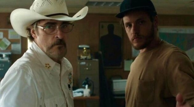 Joaquin Phoenix and Luke Grimes in “Eddington.”