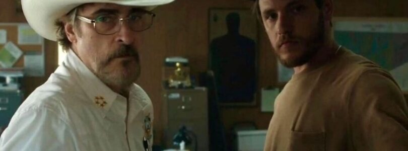 Joaquin Phoenix and Luke Grimes in “Eddington.”