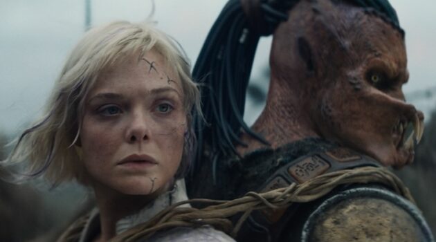 Dimitrius Schuster-Koloamatangi and Elle Fanning in “Predator: Badlands.”