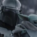The Mandalorian and Grogu in Lucasfilm's THE MANDALORIAN AND GROGU.