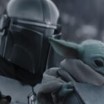 The Mandalorian and Grogu in Lucasfilm's THE MANDALORIAN AND GROGU.