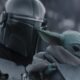 The Mandalorian and Grogu in Lucasfilm's THE MANDALORIAN AND GROGU.