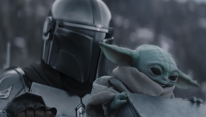 The Mandalorian and Grogu in Lucasfilm's THE MANDALORIAN AND GROGU.