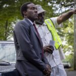 Yahya Abdul-Mateen II, left, and Director Elegance Bratton on the set of Paramount Pictures' "BY ANY MEANS."