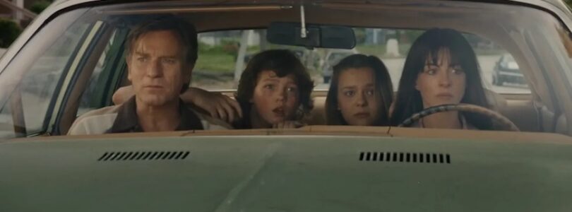 Ewan McGregor, Anne Hathaway, Maisy Stella, and Christian Convery in “The End of Oak Street.”